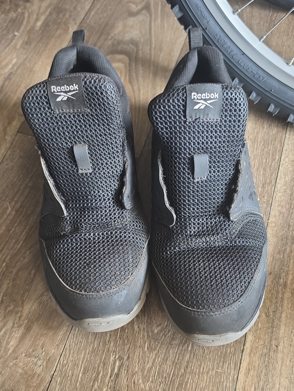 Reebok Men’s Black Slip-On Mesh Sneakers